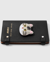 French Alran leather british shorthair cat charm detail showing hand-cut and hand-stitched layers with engraved gold-plated hardware