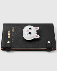 French Alran leather white British Shorthair cat face with round eyes on STICKYZOO notebook, hand-cut and stitched with multi-layer construction