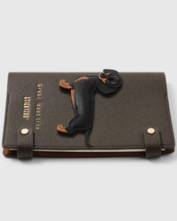 French Alran leather dachshund charm detail showing hand-cut and hand-stitched leather layers on STICKYZOO notebook