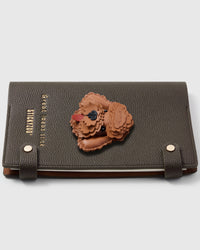 French Alran leather poodle face with curly fur detail on STICKYZOO notebook, hand-cut and stitched with multi-layer construction