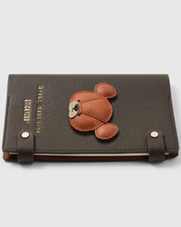 French Alran leather bear face with round ears on STICKYZOO notebook, hand-cut and stitched with multi-layer construction