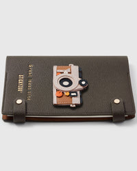 French Alran leather retro camera with lens detail on STICKYZOO notebook, hand-cut and stitched with multi-layer construction
