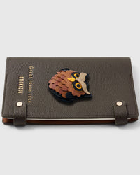 French Alran leather owl with layered feather scales on STICKYZOO notebook, hand-cut and stitched with multi-layer construction