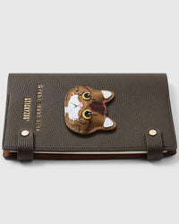 French Alran leather Exotic Shorthair cat face with tabby markings on STICKYZOO notebook, hand-cut and stitched with multi-layer construction