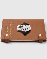 French Alran leather dalmatian charm detail showing hand-cut and hand-stitched leather layers on STICKYZOO notebook