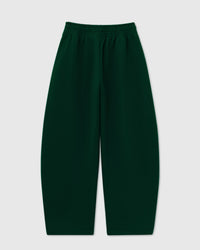 Back view of STICKYZOO Saint Teddy Bear Sweatpant in forest green showing elastic waistband and straight silhouette