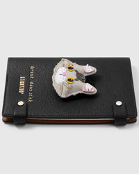 French Alran leather maine coon cat charm detail showing hand-cut and hand-stitched layers with engraved gold-plated hardware