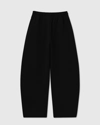 Back view of STICKYZOO Saint Teddy Bear Sweatpant in black showing elastic waistband and straight silhouette