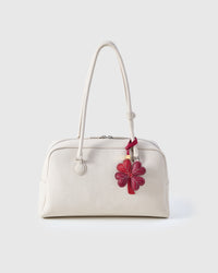 STICKYZOO Lucky Clover Charm in wine red French Alran goatskin. Hand-cut, hand-stitched. Designed in Amsterdam.