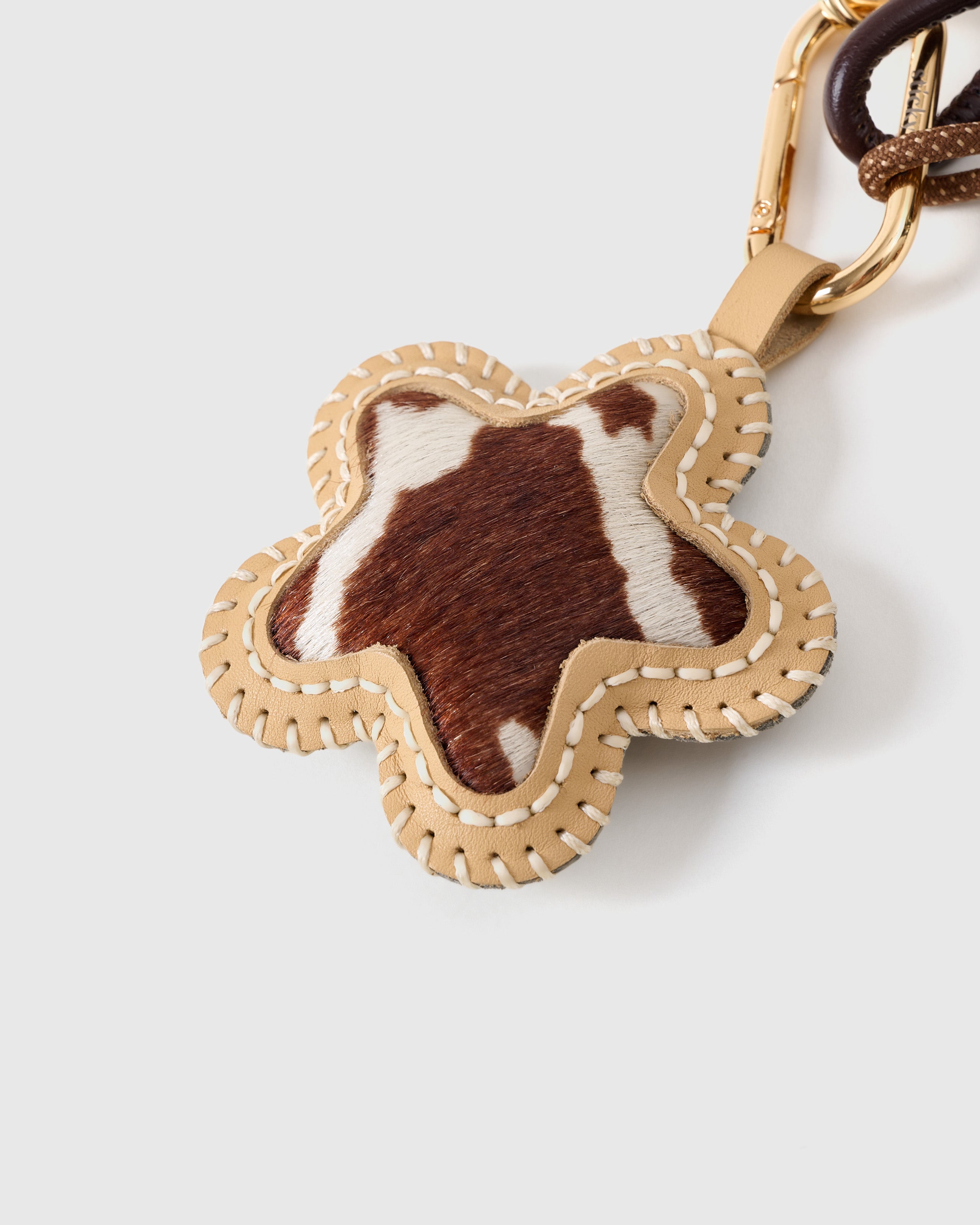 COWHIDE STAR STACK CHARM