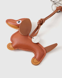 Encanto apilable de rollo de ciudad de dachshund