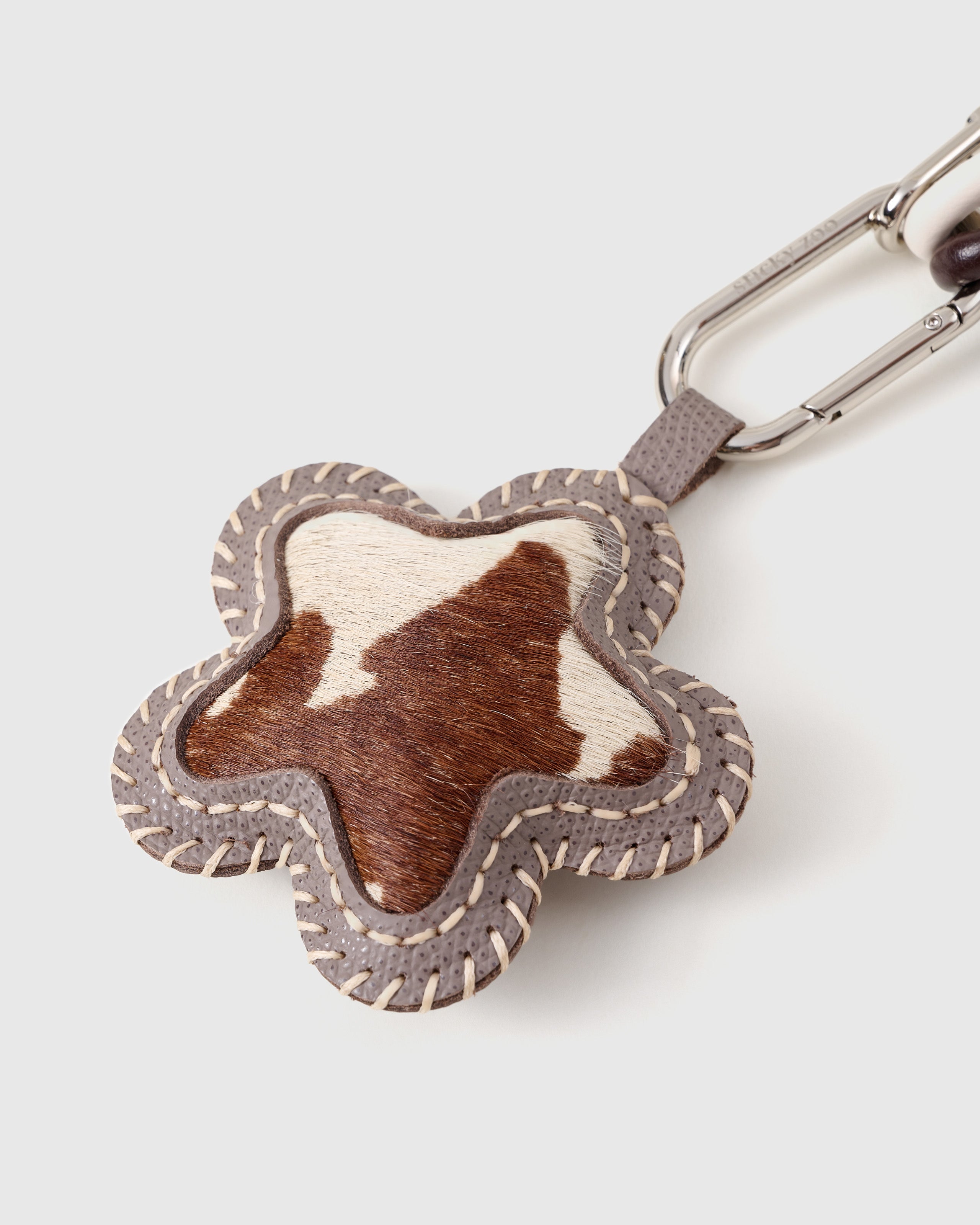 COWHIDE STAR STACK CHARM
