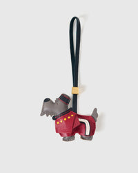 Scottish Terrier charm handmade from French Alran genuine goatskin and French suede — real full-grain leather from Tarn, since 1903. 3 days of hand-cutting, hand-stitching, hand-layering. Arrives in luxury gift packaging. Designed in Amsterdam.