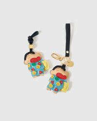 Classic Shinchan charm on a bag, side angle — 5,000+ reviews across STICKYZOO. Real French leather, 3 days by hand.