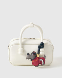 Every panel of the Scottish Terrier charm is cut by hand and stitched through real French leather. Layered slowly for depth — no prints, no stamps.