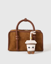 Every panel of the kawaii coffee cup charm is cut by hand and stitched through real French leather. Layered slowly for depth — no prints, no stamps.