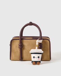 Every panel of the kawaii coffee cup charm is cut by hand and stitched through real French leather. Layered slowly for depth — no prints, no stamps.