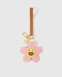 STICKYZOO Bloomy Sakura Charm in soft pink and golden yellow — handmade French Alran goatskin with 18K gold-plated hardware. Arrives gift-ready.