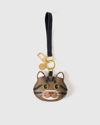 Brown tabby American Shorthair on an 18K gold-plated keychain clip with engraved STICKYZOO disc — clips to keys, bags or backpacks.