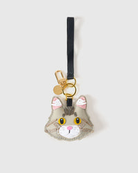The silver Maine Coon on an 18K gold-plated clip with engraved STICKYZOO disc — clip it to keys, bags, or backpacks.