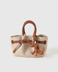Handmade Basset Hound leather bag charm — French Alran goatskin from a tannery founded in 1903 in Tarn, France. STICKYZOO.