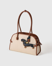 Handmade full-body Dachshund bag charm with 18K gold-plated keychain clip and engraved STICKYZOO gold tag — for keys, bags, and backpacks. French Alran goatskin.