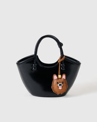 The pomeranian charm is made from genuine French Alran goatskin and French suede — real full-grain leather. Never vegan. Never synthetic. The difference shows.