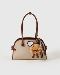 Colgante apilable en forma de corazón con pretzel sonriente