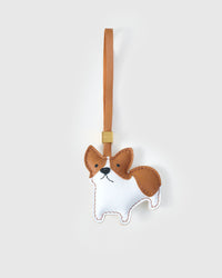 Pembroke Welsh Corgi charm handmade from French Alran genuine goatskin and French suede — real full-grain leather from Tarn, since 1903. 3 days of hand-cutting, hand-stitching, hand-layering. Arrives in luxury gift packaging. Designed in Amsterdam.