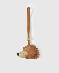 HEDGEHOG CHARM charm handmade from French Alran genuine goatskin — A hedgehog in profile. Walking. The quills are stitched —. Three days by hand. Arrives in luxury gift packaging. Designed in Amsterdam.