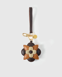 STICKYZOO Petal Espresso Charm in dark chocolate, caramel, and cream — handmade French Alran goatskin with 18K gold-plated hardware. Arrives gift-ready.