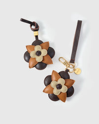 STICKYZOO Petal Espresso Charm — hand-layered French Alran goatskin, three-tier layered flower. Designed in Amsterdam.