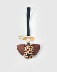 Handmade Dalmatian Spot leather bag charm clipped to a leather handbag — French Alran goatskin, hand-cut and hand-stitched. STICKYZOO.