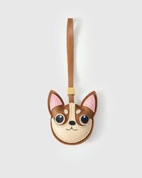 Handmade Chihuahua leather bag charm by STICKYZOO — hand-cut, hand-stitched French Alran goatskin in caramel over 5 days. Designed in Amsterdam.
