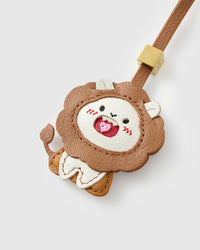 LION CHARM charm on a bag — real French Alran leather, 3 days by hand.