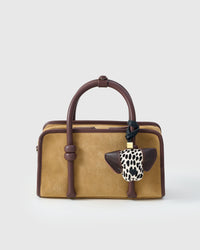Handmade Dalmatian Spot leather bag charm on a handbag — hand-cut, hand-stitched, hand-layered French Alran goatskin. STICKYZOO.