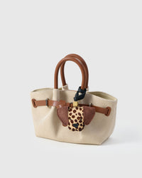 Handmade Dalmatian Spot leather bag charm with 18K gold-plated cube hardware engraved with STICKYZOO — French Alran goatskin, 5-day artisan build.