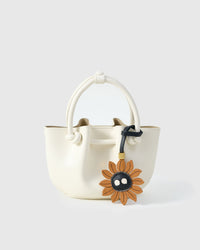 STICKYZOO Sunflower Mood Charm — hand-layered French Alran goatskin, sunflower petals with character face. Designed in Amsterdam.