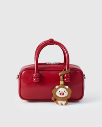 LION CHARM — finished one at a time, by hand. Real French Alran goatskin.