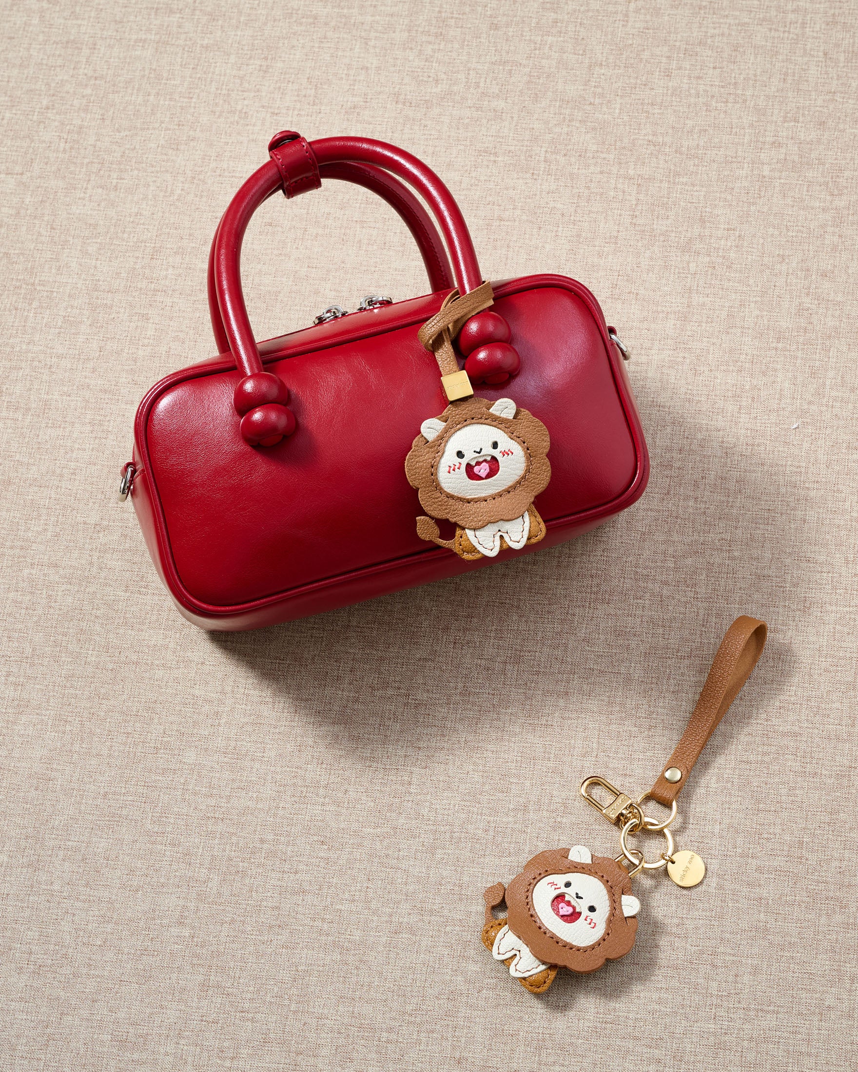 LION CHARM