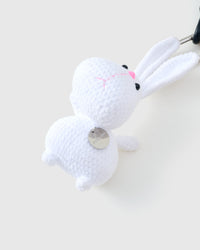 CHARME DE PILE DE LAPIN JOUEUR DE BOULES DE GOMME