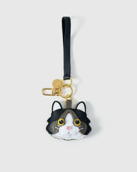 Black Ragdoll on an 18K gold-plated keychain clip with engraved STICKYZOO disc — clips to keys, bags or backpacks.