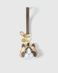 Cream Ragdoll on an 18K gold-plated keychain clip with engraved STICKYZOO disc — clips to keys, bags or backpacks.