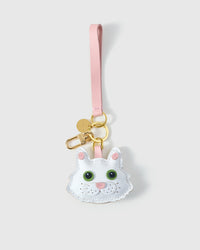 White Maine Coon on an 18K gold-plated keychain clip with engraved STICKYZOO disc — clips to keys, bags or backpacks.
