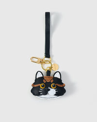 Long-hair tabby cat charm in three editions — orange, black, and gray-white. Real French Alran goatskin, finished one at a time by hand.