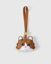 Gray European Shorthair — real French Alran leather develops a natural patina the longer it's carried.