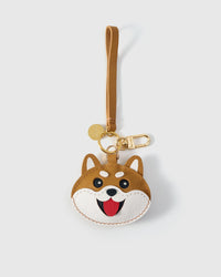 The shiba inu face charm is made from genuine French Alran goatskin and French suede — real full-grain leather. Never vegan. Never synthetic. The difference shows.