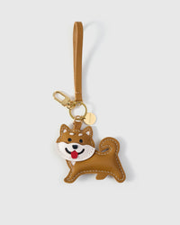 The shiba inu charm is made from genuine French Alran goatskin and French suede — real full-grain leather. Never vegan. Never synthetic. The difference shows.