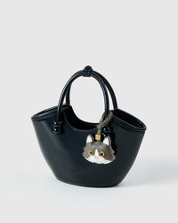 Gray European Shorthair on a bag, side angle — loved by thousands of cat people. Real French leather, 3 days by hand.
