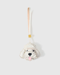 Handmade Poodle leather bag charm — full-grain French Alran goatskin with visible hand-stitched edges. STICKYZOO Amsterdam design.